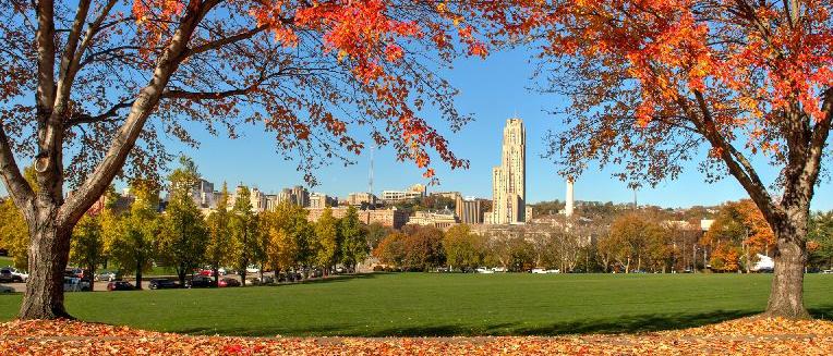 "Photo of Oakland in the fall, featuring the Cathedral of Learning."